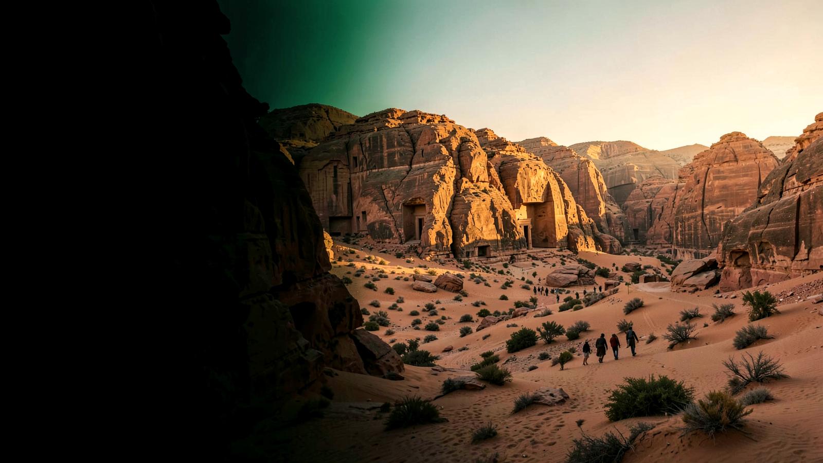 Visitors walking through the sandstone landscape of AlUla